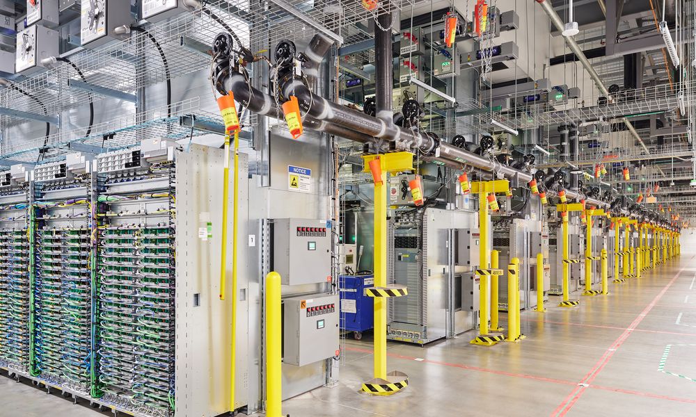 Server aisles representing AI-driven data centre operations
